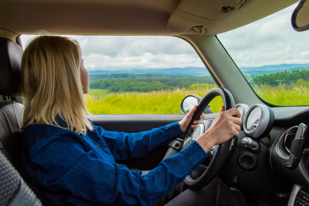 lady driving in the peak distric